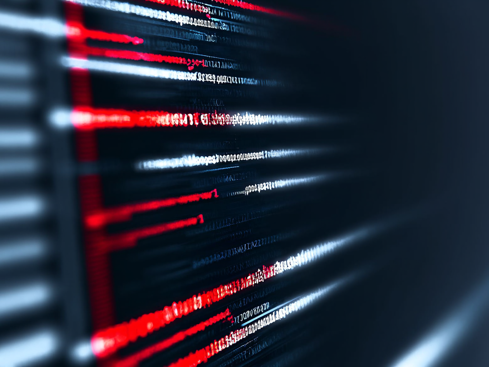 Streaks of code across a dark screen